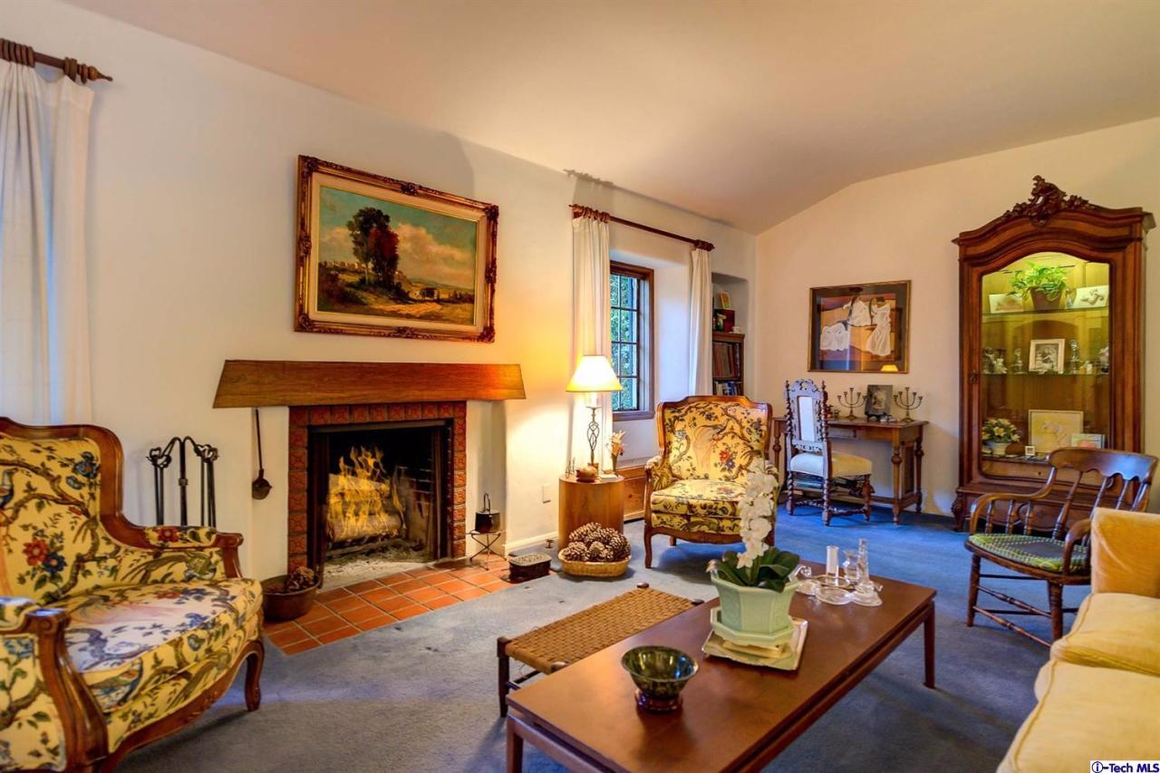 1271 Roanoke Road San Marino, CA 91108 - Photo 17 of 65 a living room with furniture and a fireplace