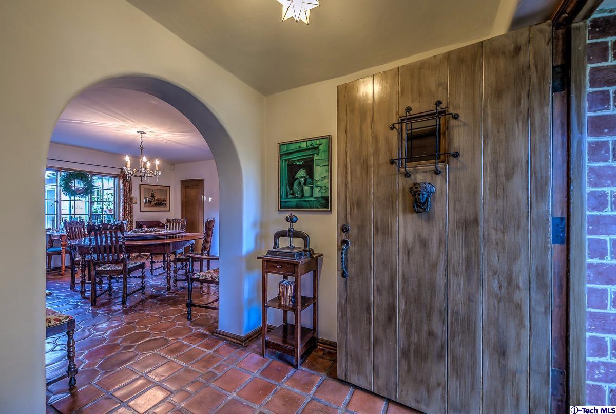1271 Roanoke Road San Marino, CA 91108 - Photo 19 of 65 a view of a hallway with wooden shelves
