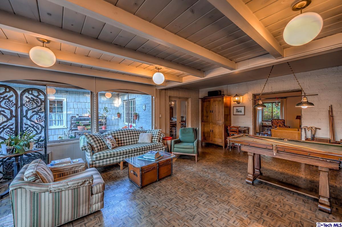 1271 Roanoke Road San Marino, CA 91108 - Photo 33 of 65 a living room with furniture and a potted plant