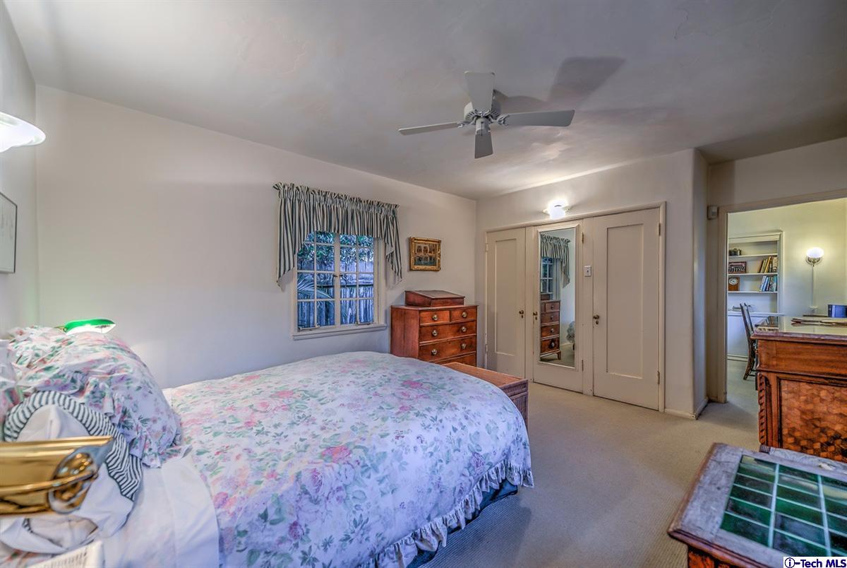 1271 Roanoke Road San Marino, CA 91108 - Photo 36 of 65 a spacious bedroom with a bed and a dresser in it
