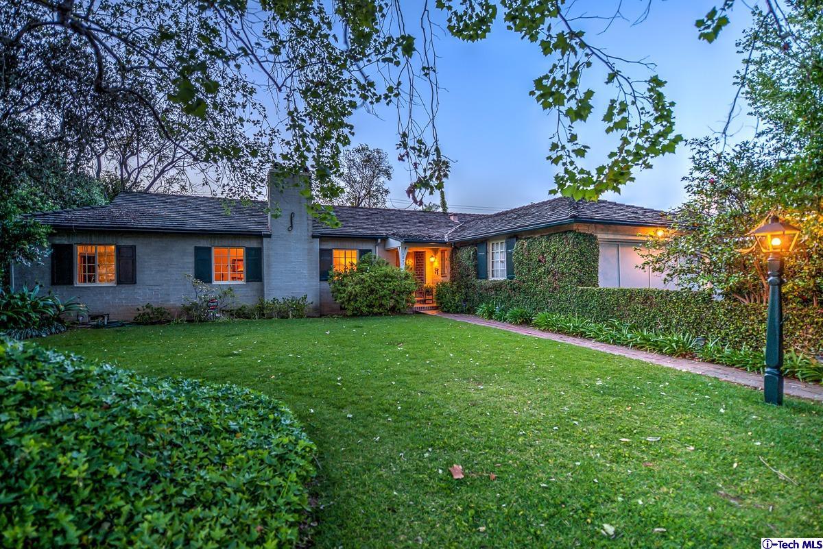 1271 Roanoke Road San Marino, CA 91108 - Photo 5 of 65 a front view of a house with a yard