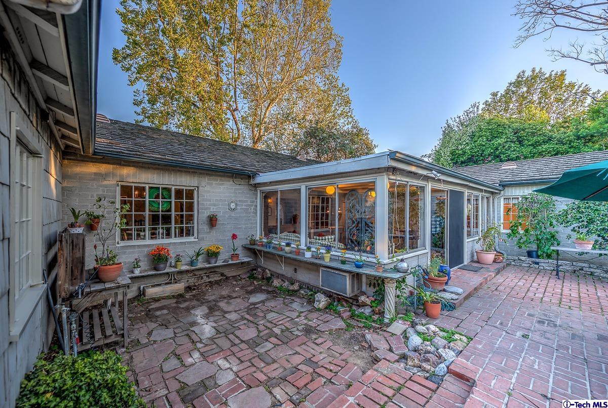 1271 Roanoke Road San Marino, CA 91108 - Photo 51 of 65 a front view of a house with garden