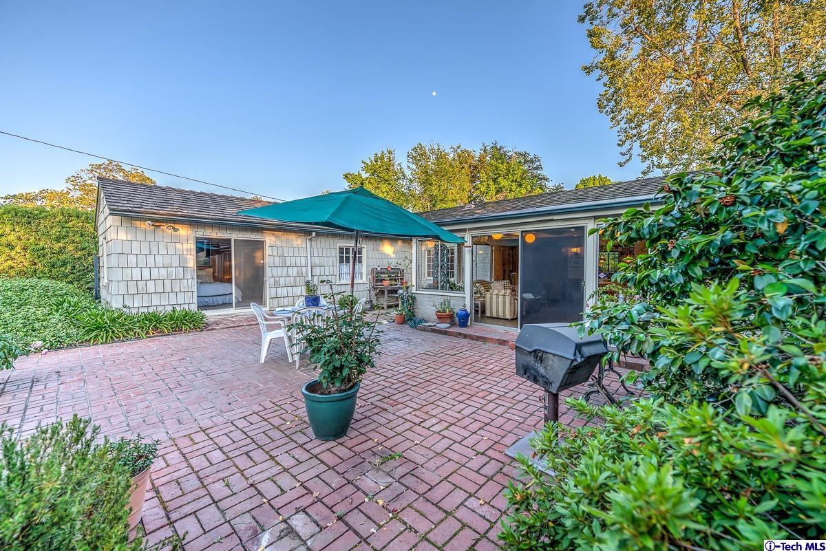 1271 Roanoke Road San Marino, CA 91108 - Photo 52 of 65 a front view of a house with garden