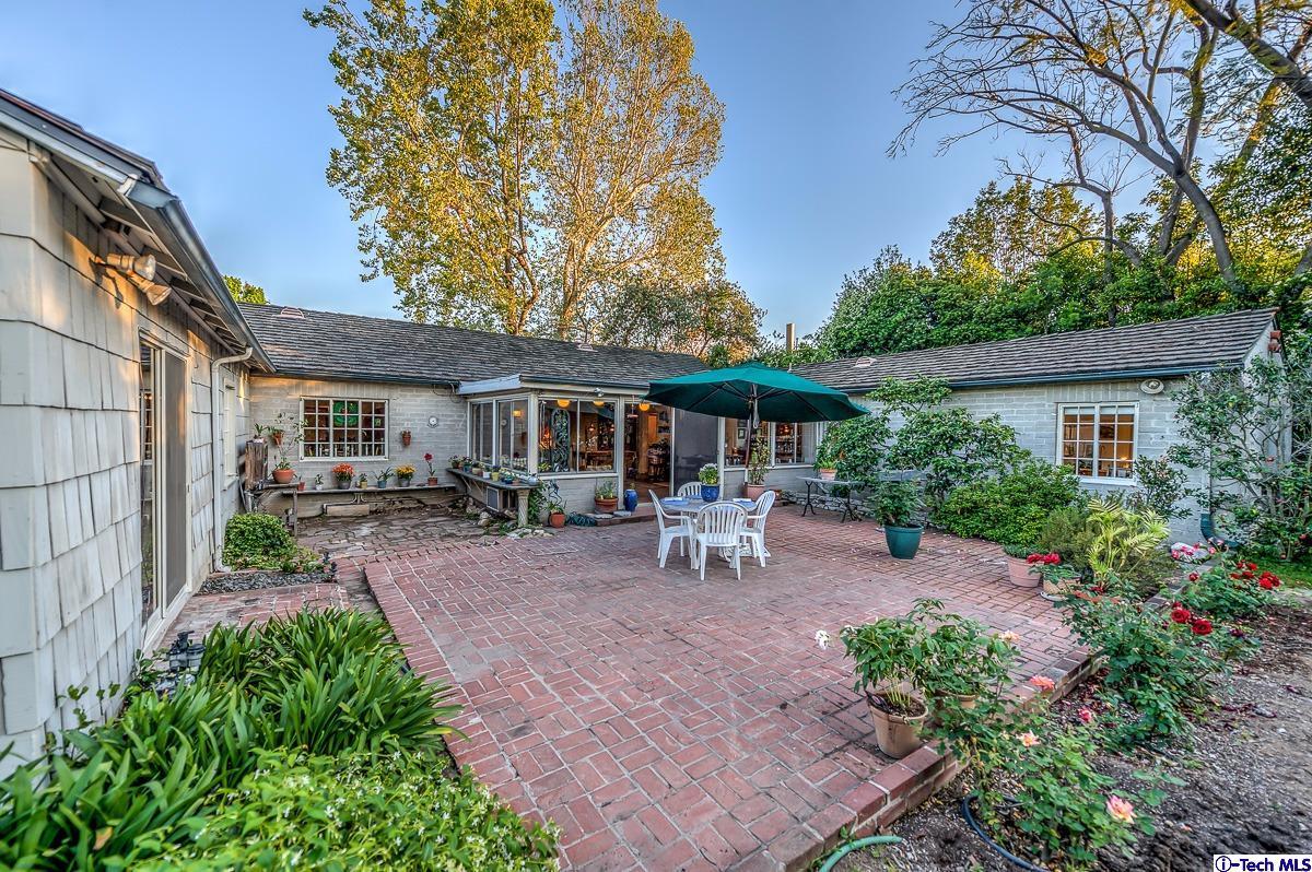 1271 Roanoke Road San Marino, CA 91108 - Photo 53 of 65 a view of a house with backyard and sitting area