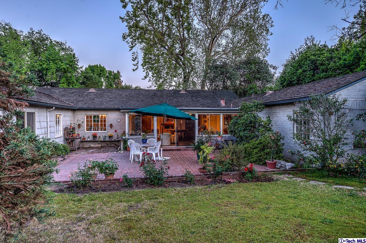 1271 Roanoke Road San Marino, CA 91108 - Photo 55 of 65 a front view of a house with yard and outdoor seating