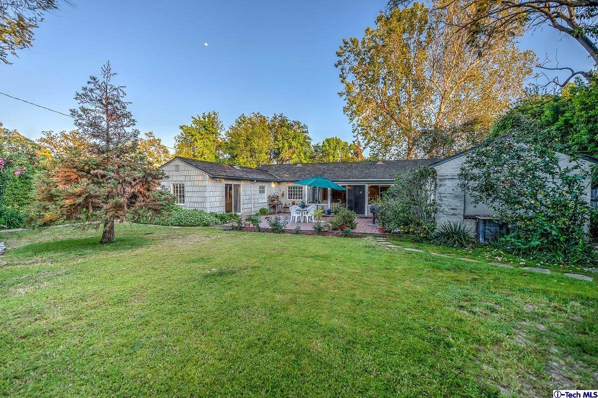 1271 Roanoke Road San Marino, CA 91108 - Photo 56 of 65 a front view of a house with a garden