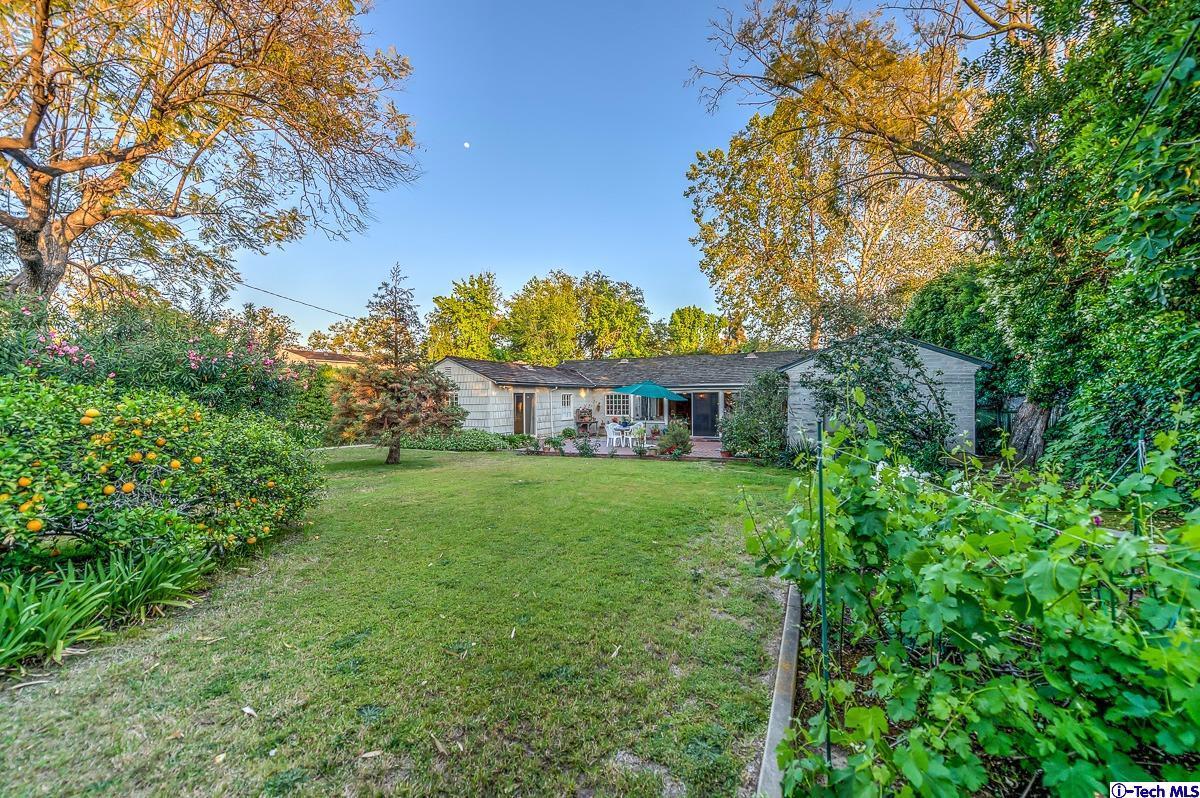 1271 Roanoke Road San Marino, CA 91108 - Photo 58 of 65 a view of a house with a backyard