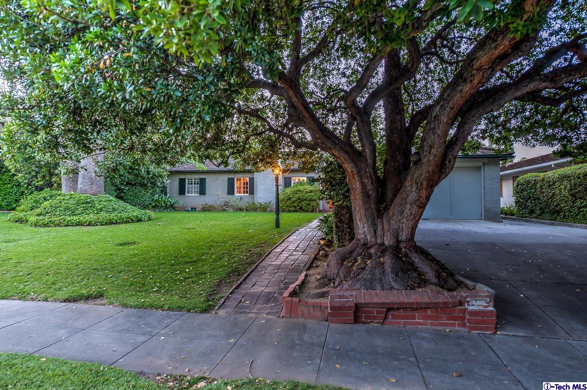 1271 Roanoke Road San Marino, CA 91108 - Photo 7 of 65 a front view of a house with a yard