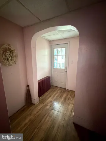 a kitchen with stainless steel appliances wooden cabinets a sink and a stove