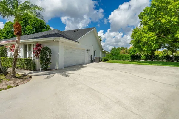 $1,295,000 | 15575 Woodmar Court, Wellington, FL 33414