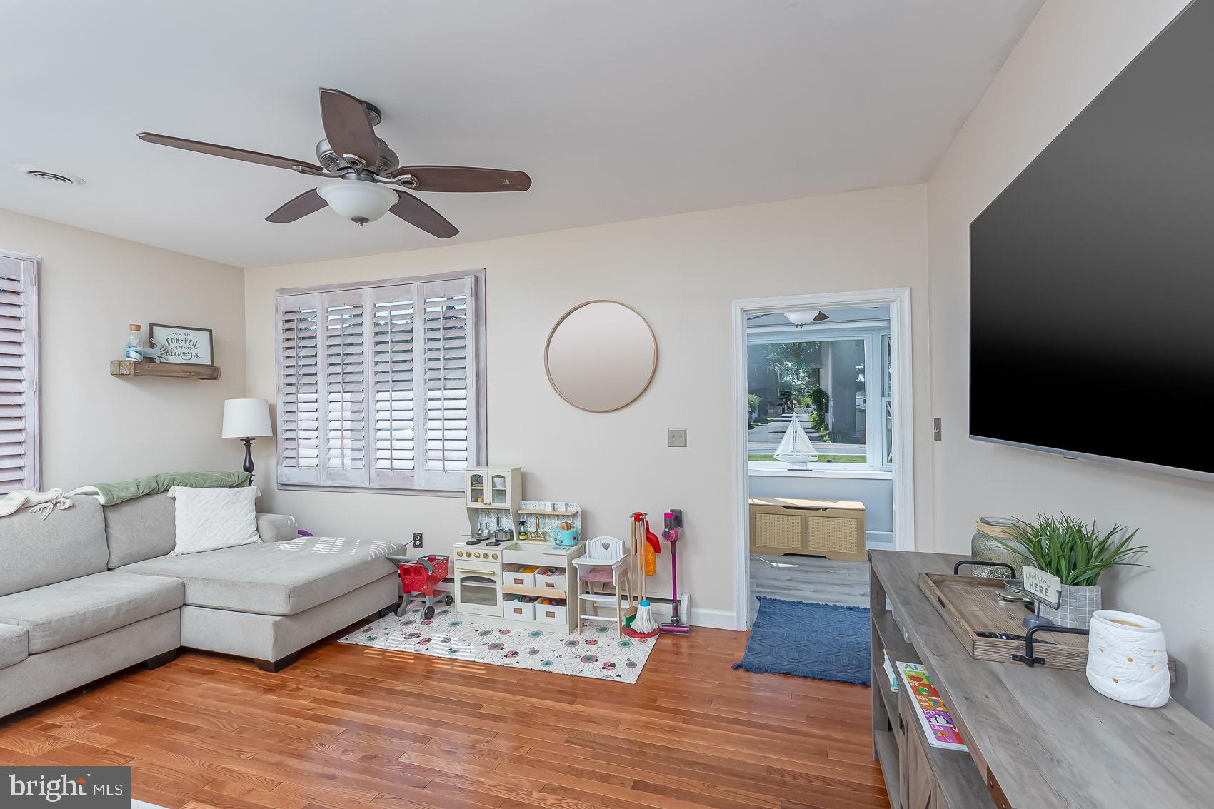 1626 Cape May Road Baltimore, MD 21221 - Photo 14 of 37 Living Room with Plantation Shutters