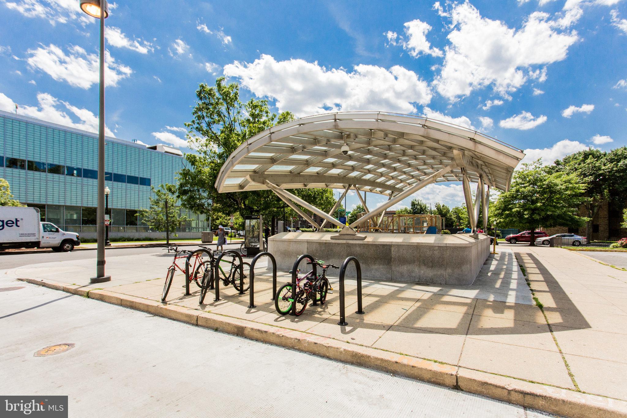 1001 L Street Northwest, Unit 811 Washington, DC 20001 - Photo 39 of 45 a view of a patio with a table and chairs