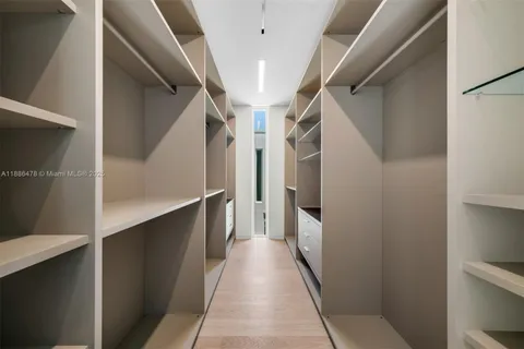 a utility room with sink dryer and washer