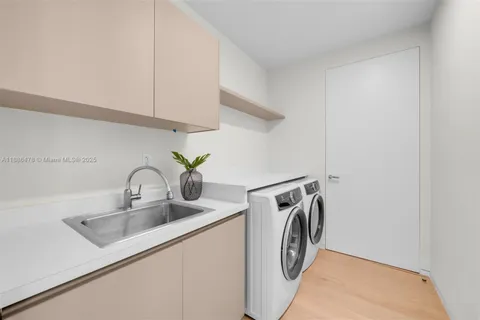 a view of a lake with couches chair and table