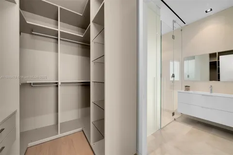 a view of a house with backyard sitting area and garden