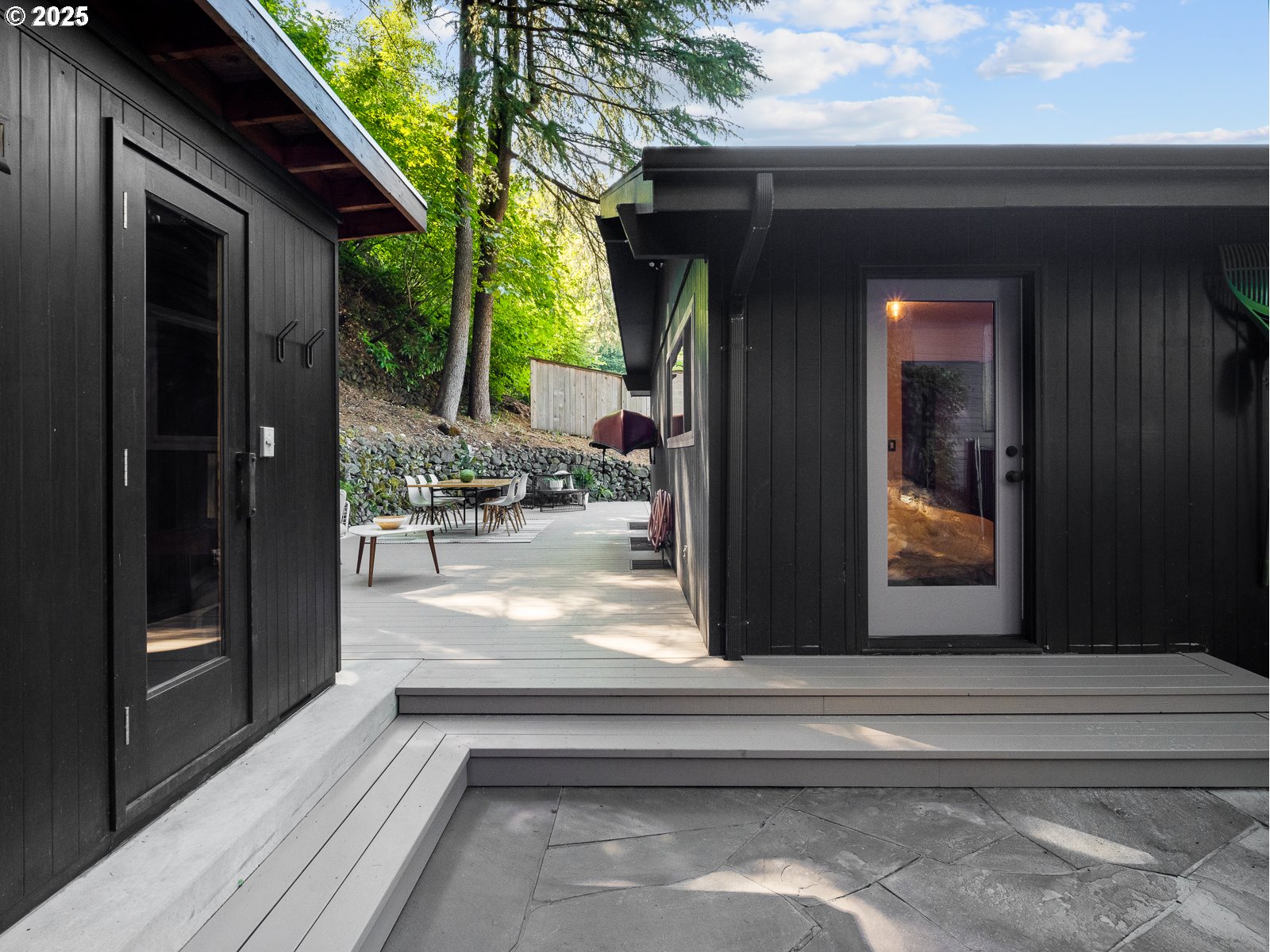 6950 Southeast Ash Street Portland, OR 97215 - Photo 17 of 45 a view of backyard from a hallway