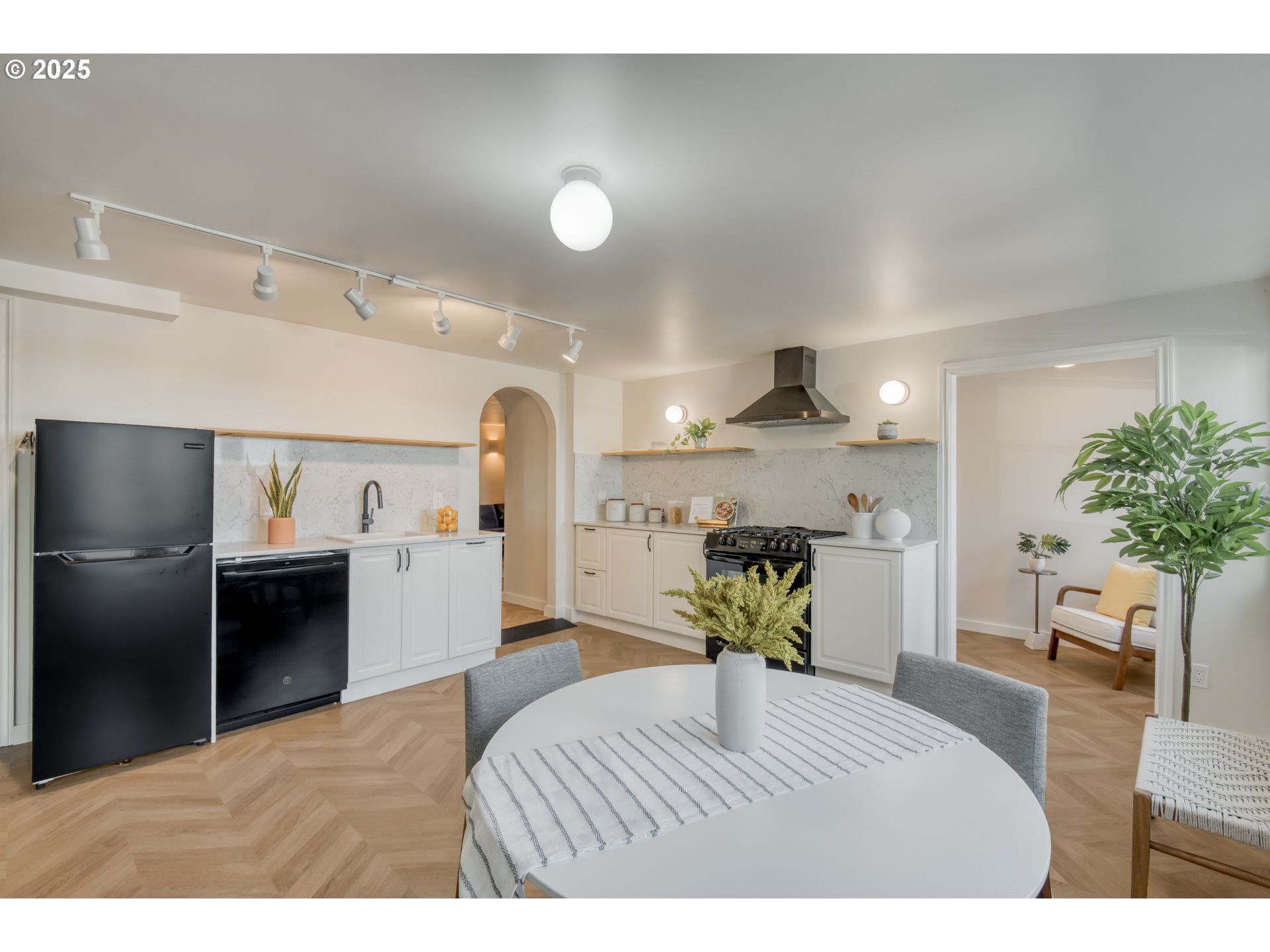6950 Southeast Ash Street Portland, OR 97215 - Photo 27 of 45 a living room with furniture and a table
