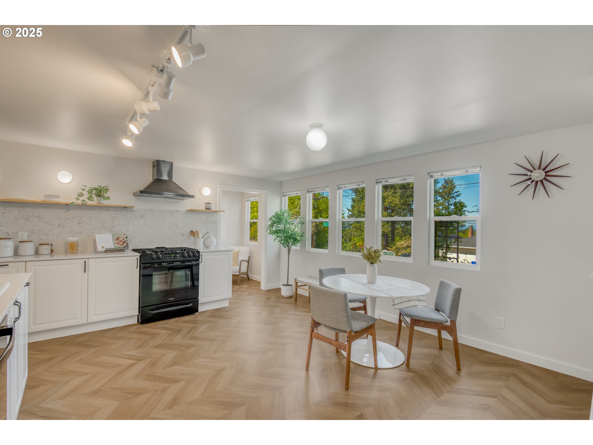 6950 Southeast Ash Street Portland, OR 97215 - Photo 28 of 45 a view of a dining room with furniture window and outside view