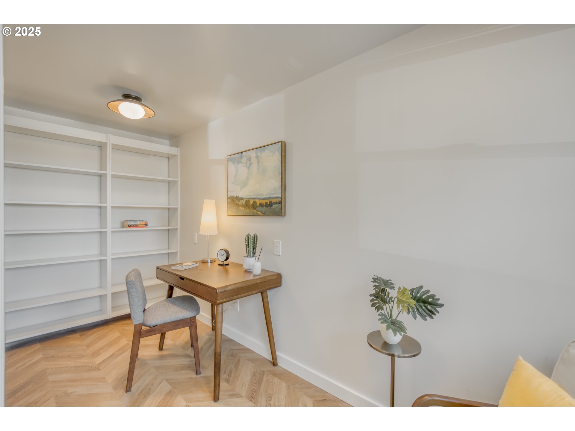 6950 Southeast Ash Street Portland, OR 97215 - Photo 30 of 45 a room with furniture and a table