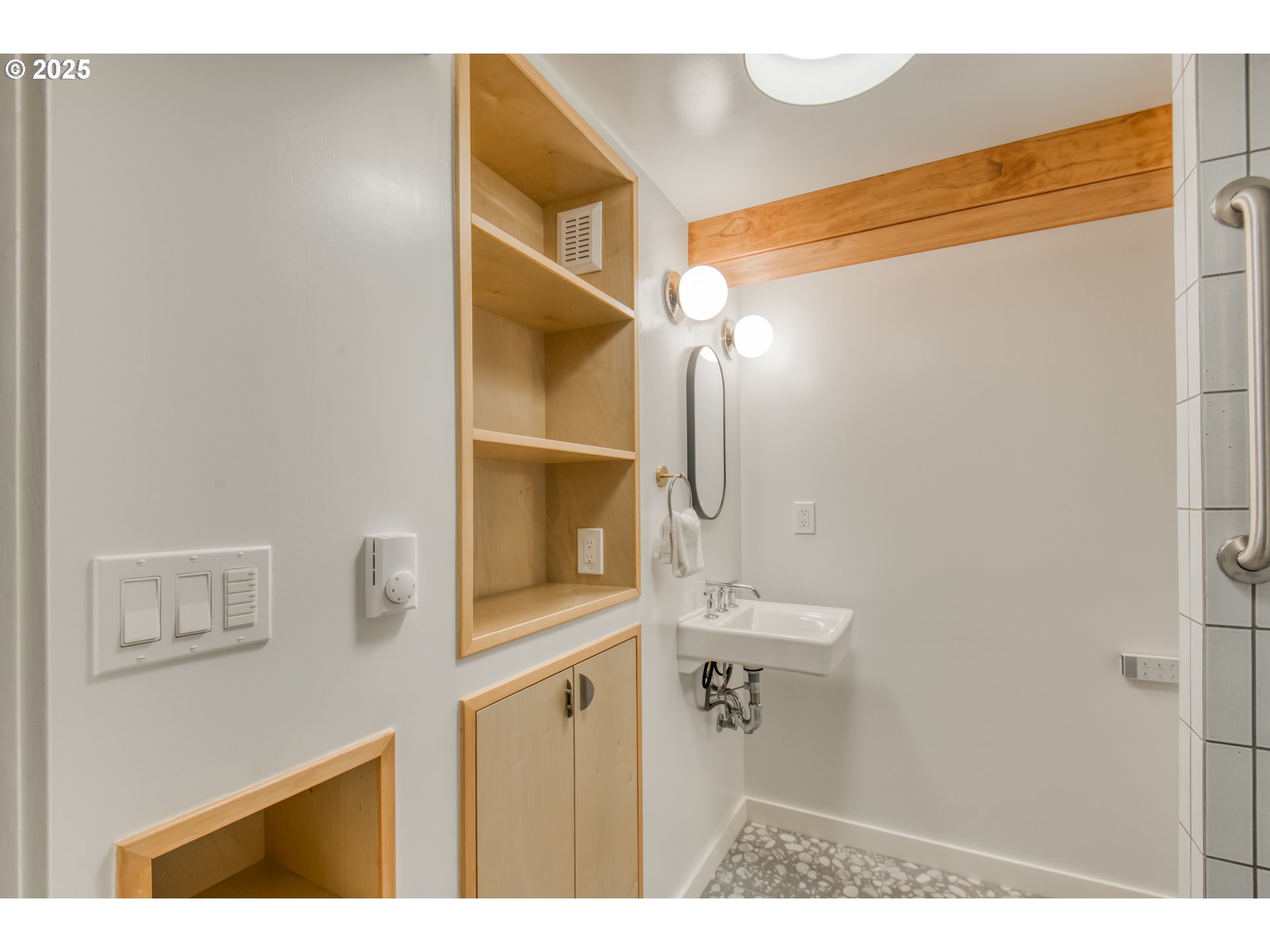 6950 Southeast Ash Street Portland, OR 97215 - Photo 33 of 45 a picture of a bathroom