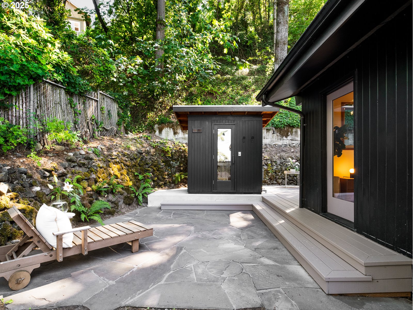 6950 Southeast Ash Street Portland, OR 97215 - Photo 35 of 45 a view of a chair and table in the patio