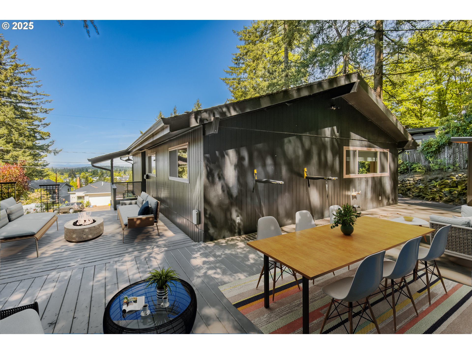 6950 Southeast Ash Street Portland, OR 97215 - Photo 39 of 45 a backyard of a house with table and chairs