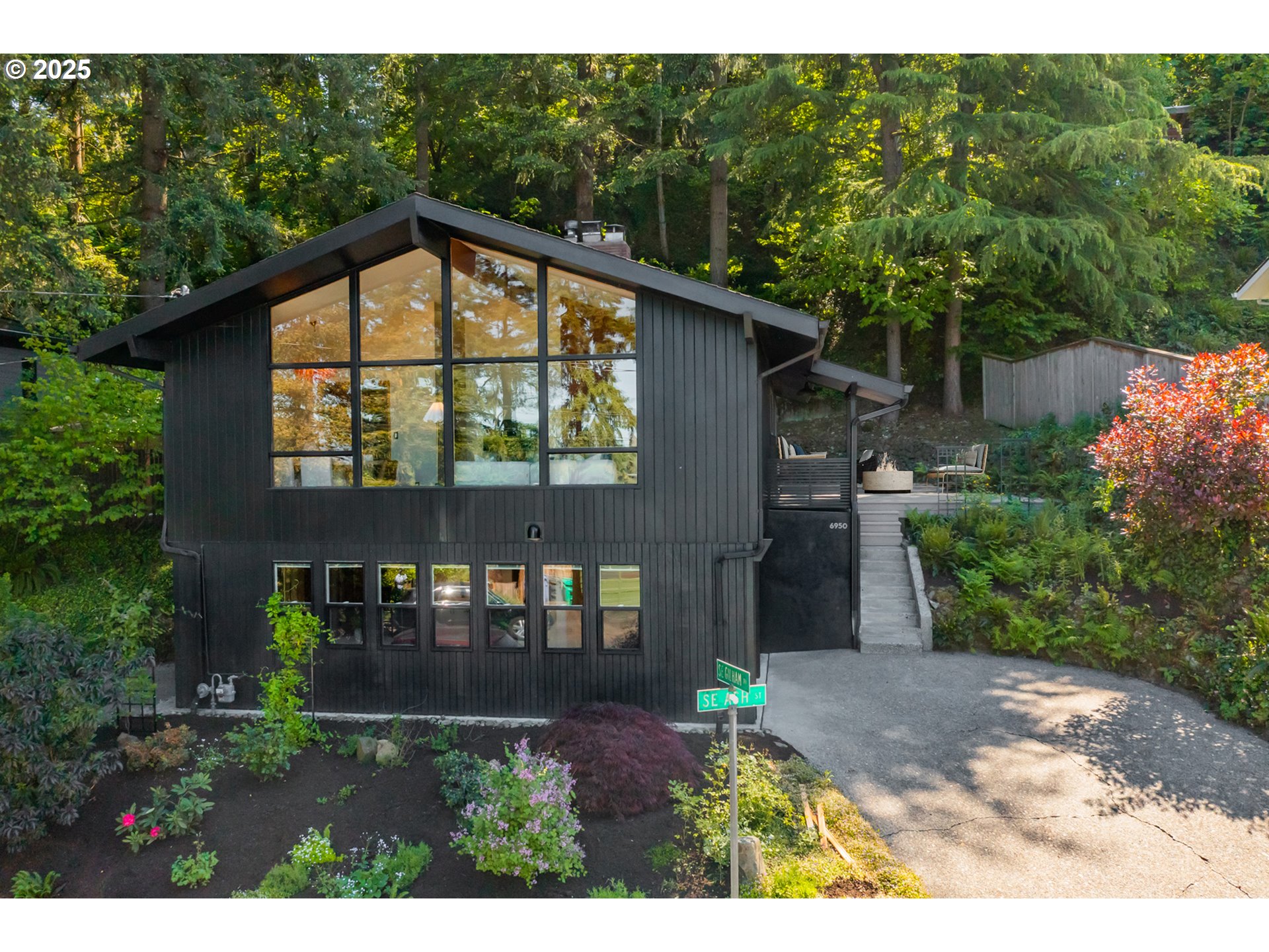 6950 Southeast Ash Street Portland, OR 97215 - Photo 45 of 45 a view of a house with a yard