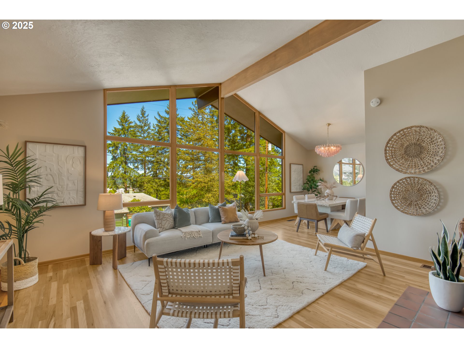 6950 Southeast Ash Street Portland, OR 97215 - Photo 6 of 45 a living room with furniture and a large window