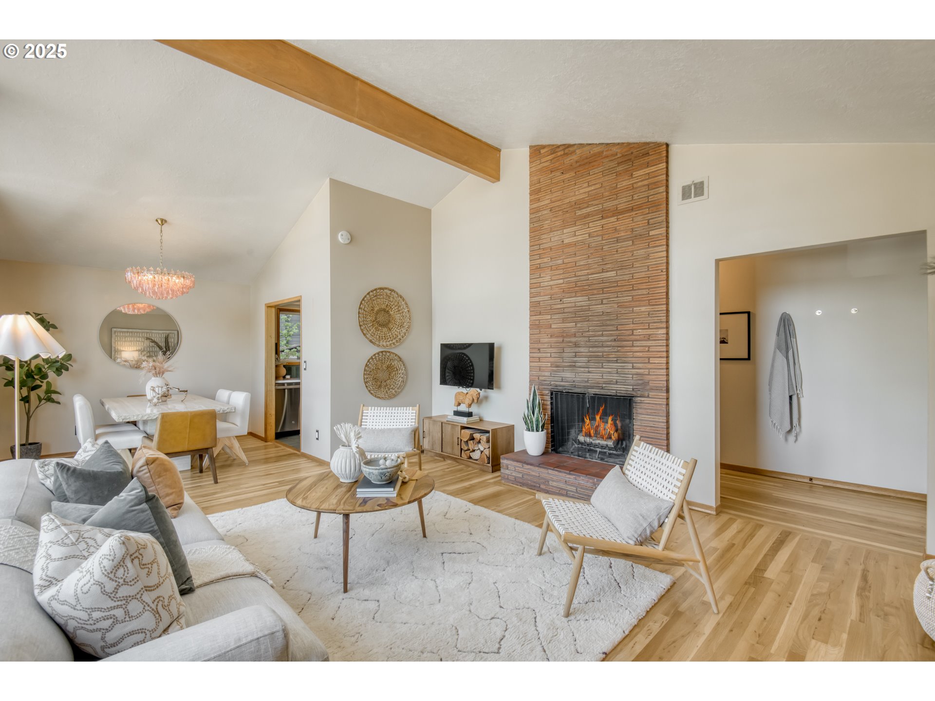 6950 Southeast Ash Street Portland, OR 97215 - Photo 7 of 45 a living room with furniture and a fireplace
