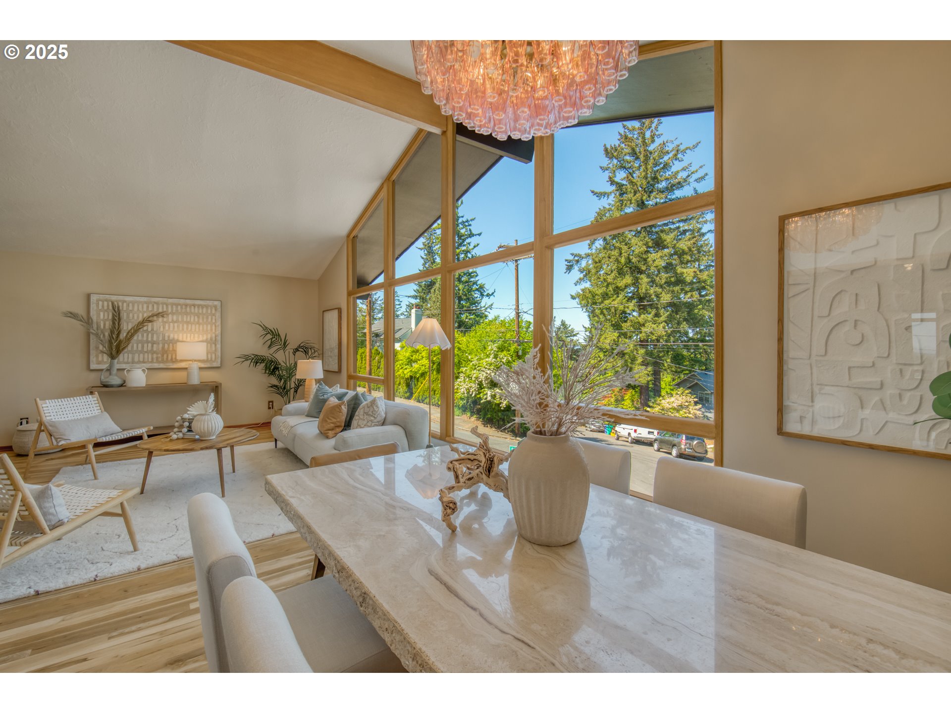 6950 Southeast Ash Street Portland, OR 97215 - Photo 9 of 45 a living room with furniture and a large window