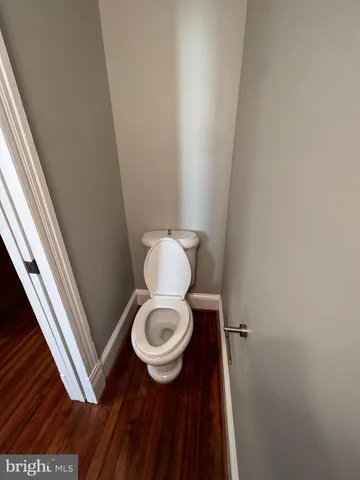 a bathroom with a toilet and a sink