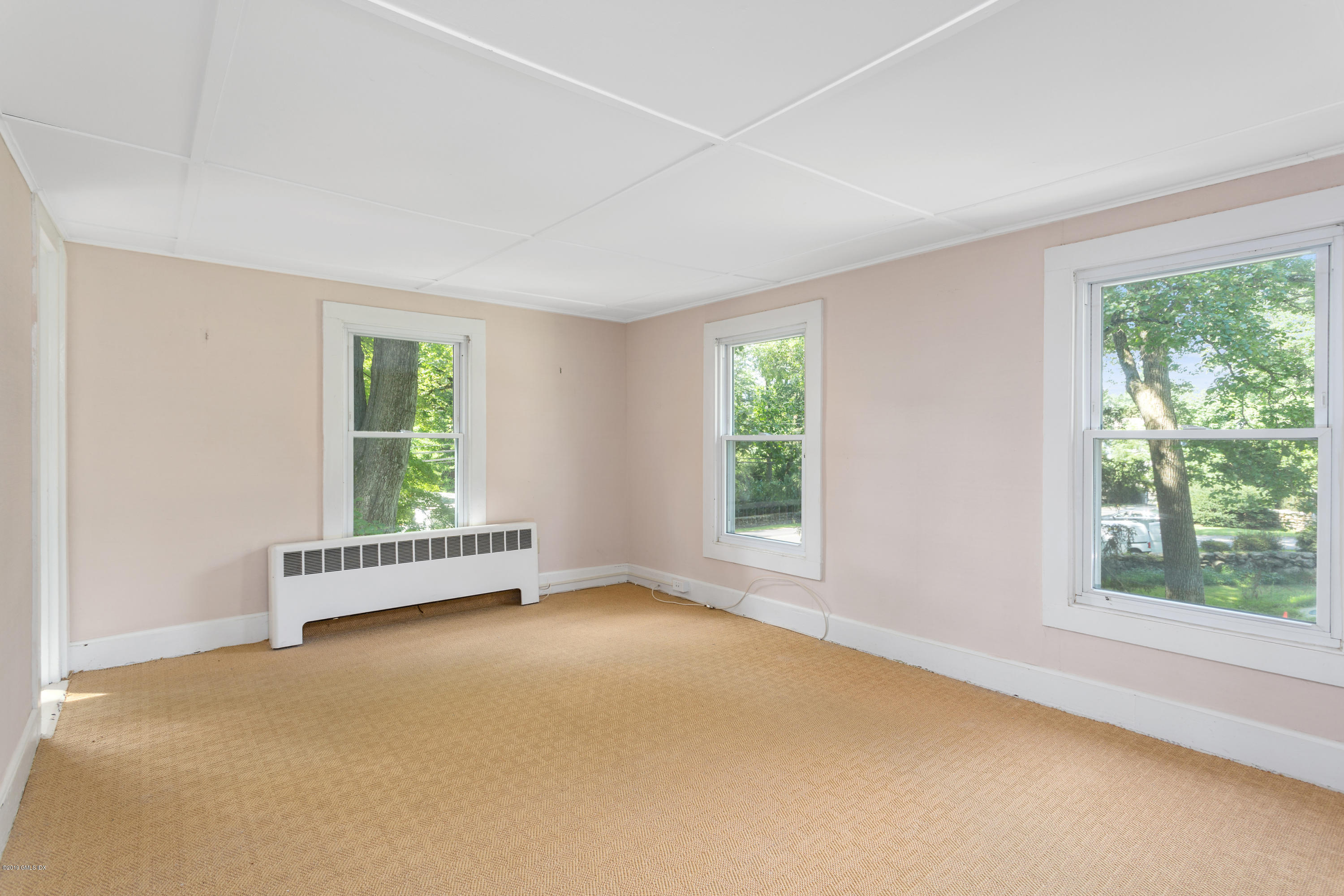 33 Parsonage Road Greenwich, CT 06830 - Photo 8 of 11 an empty room with windows