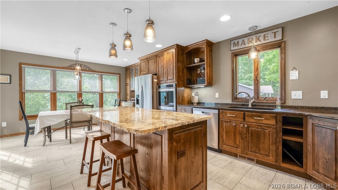 490 Waterfowl Road Linn Creek, MO 65052 - Photo 14 of 52 Island Seating
