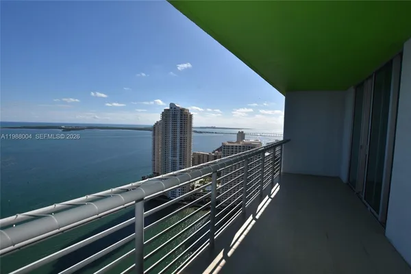 a view of balcony with furniture