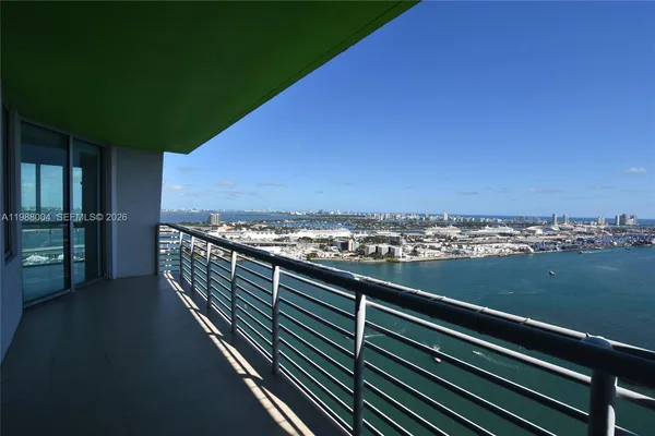 a view of balcony with furniture
