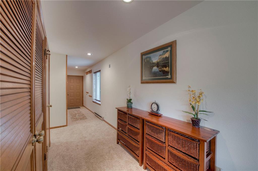 4811 Ryan Gulch Road, Unit 4811 Silverthorne, CO 80498 - Photo 17 of 35 a hallway with a elevator