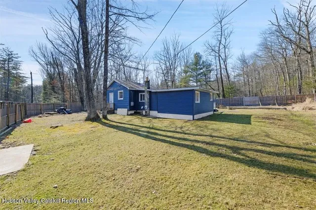 a view of swimming pool with a yard