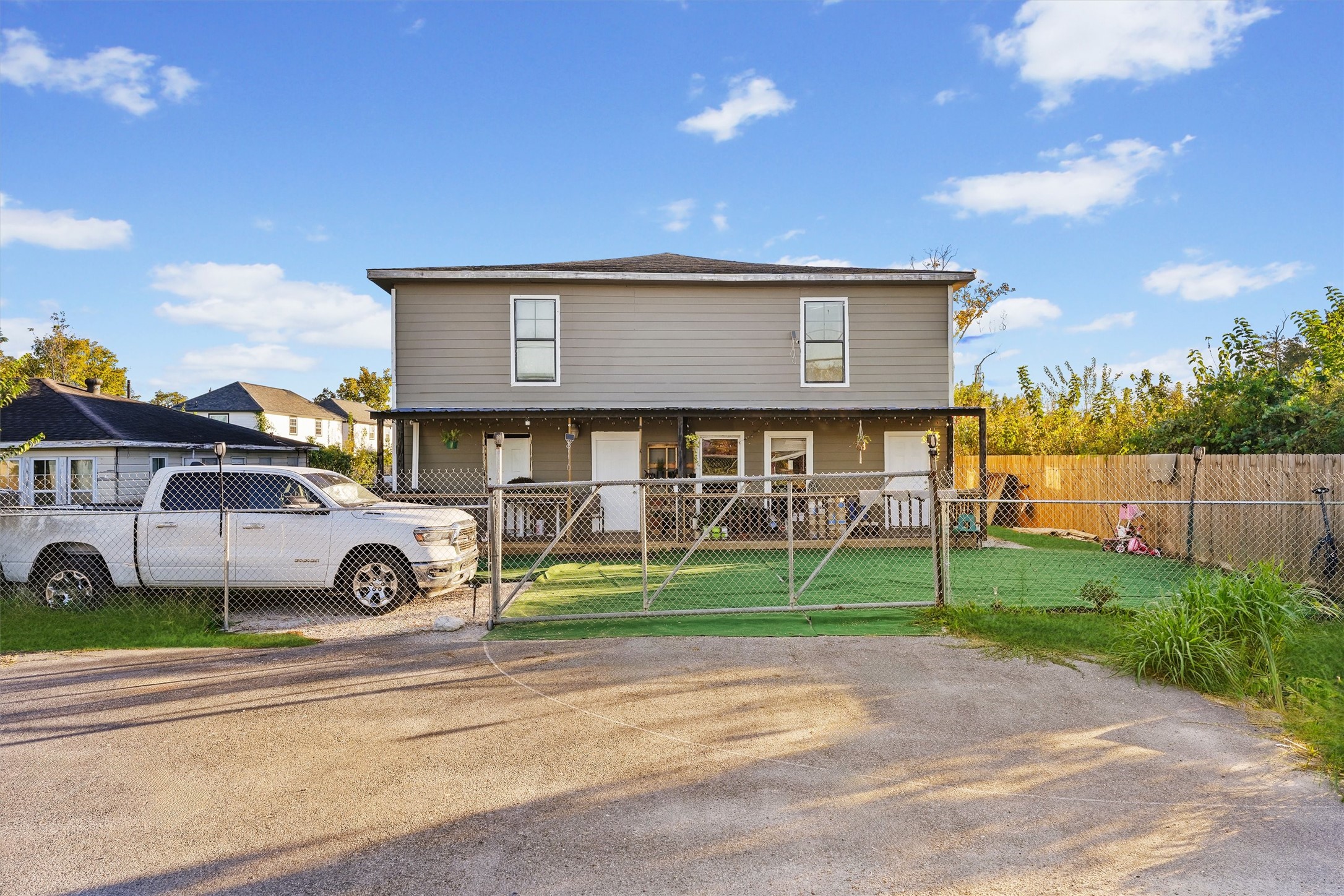 a view of house that has a yard