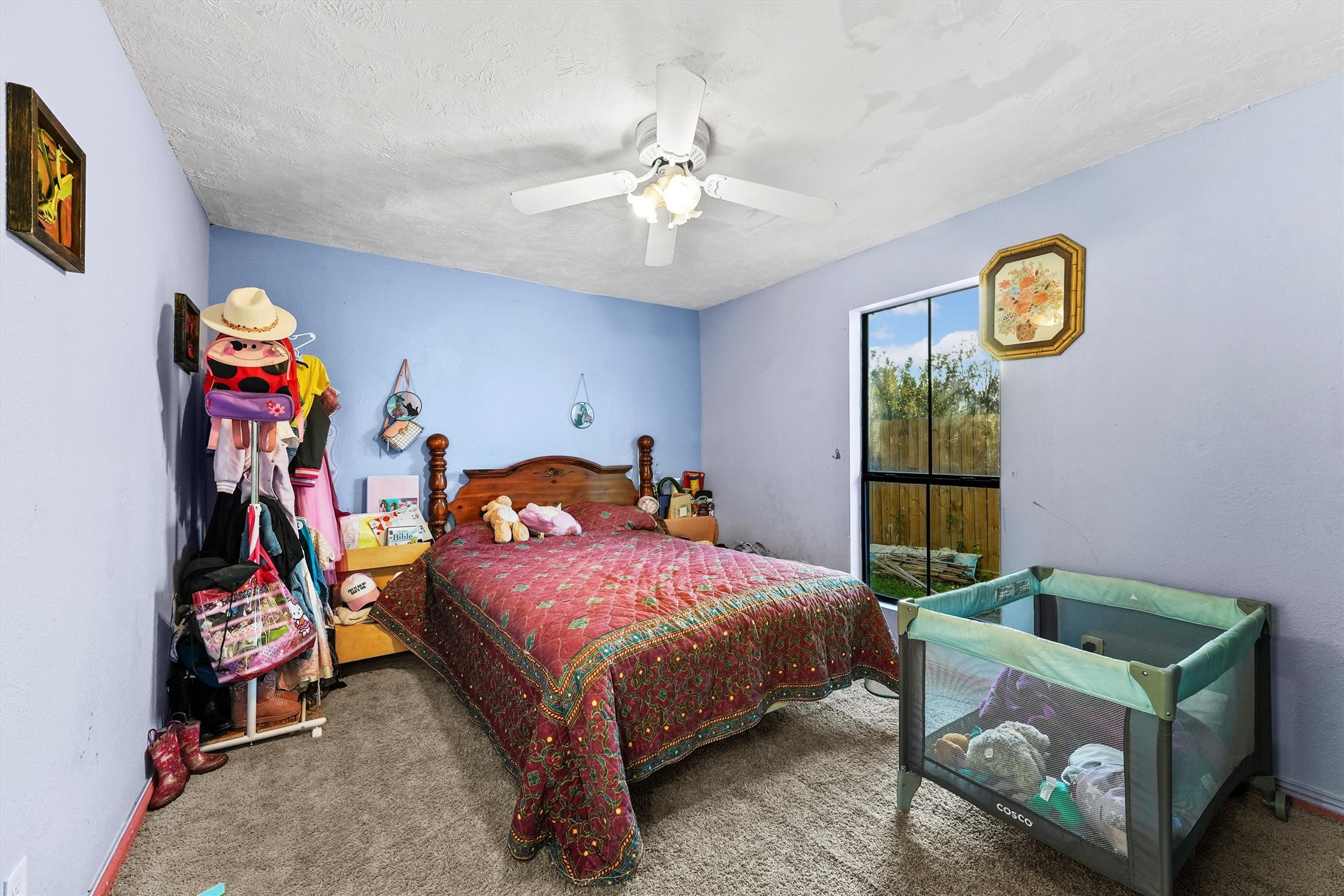 4322 Bennington Street Houston, TX 77016 - Photo 11 of 26 a bedroom with bed and a window