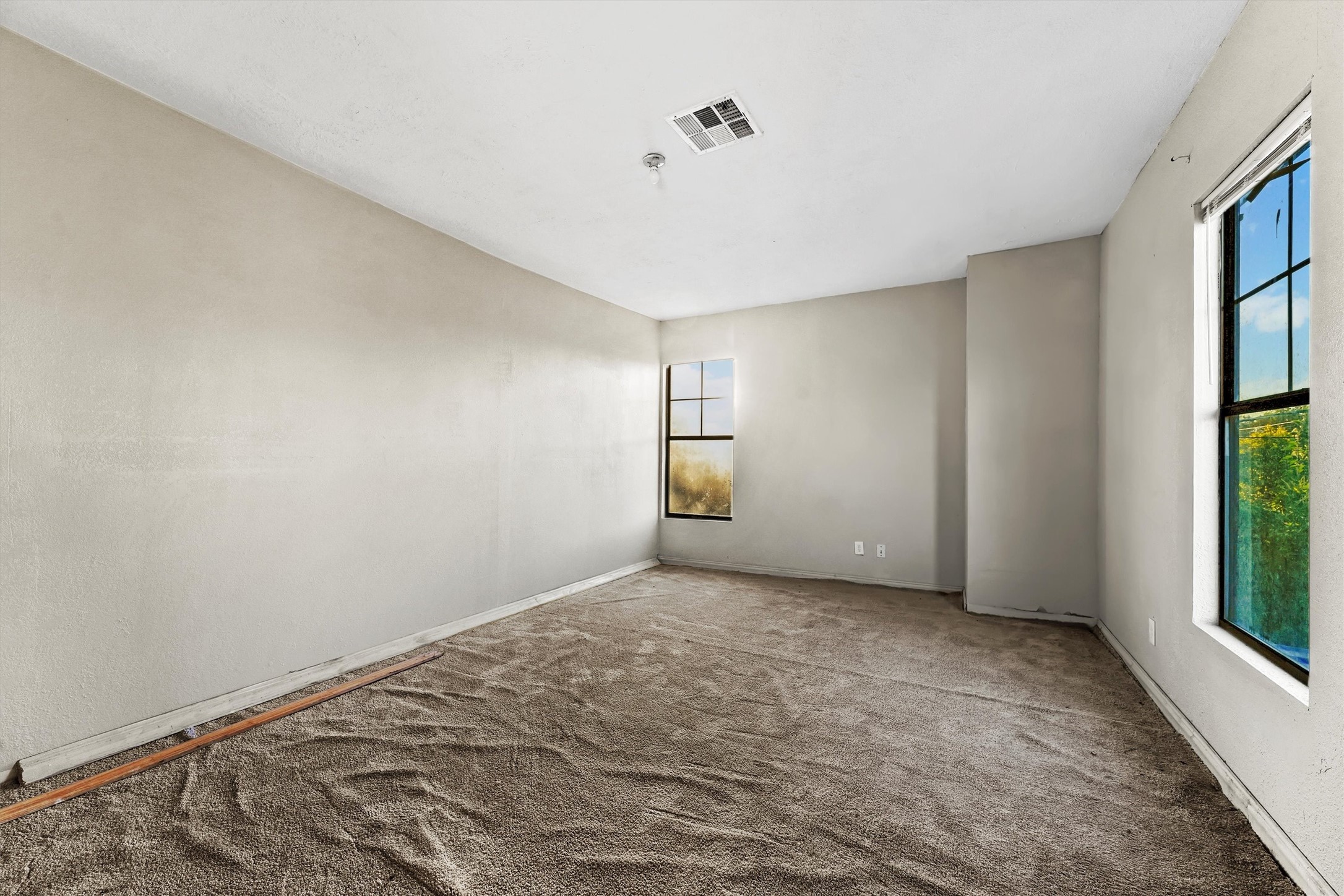 4322 Bennington Street Houston, TX 77016 - Photo 16 of 26 a view of an empty room with a window