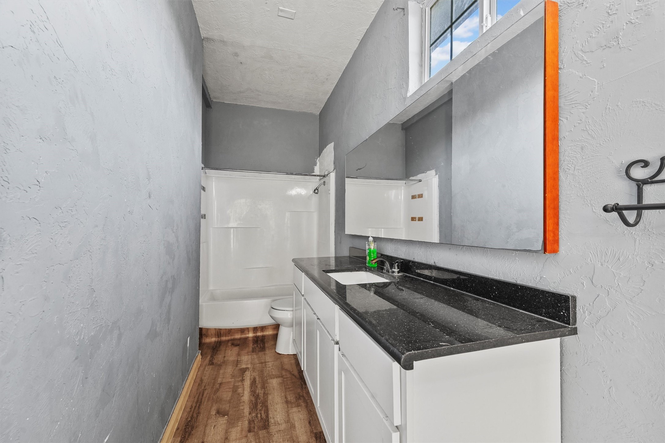 4322 Bennington Street Houston, TX 77016 - Photo 23 of 26 a kitchen with granite countertop a sink and a stove