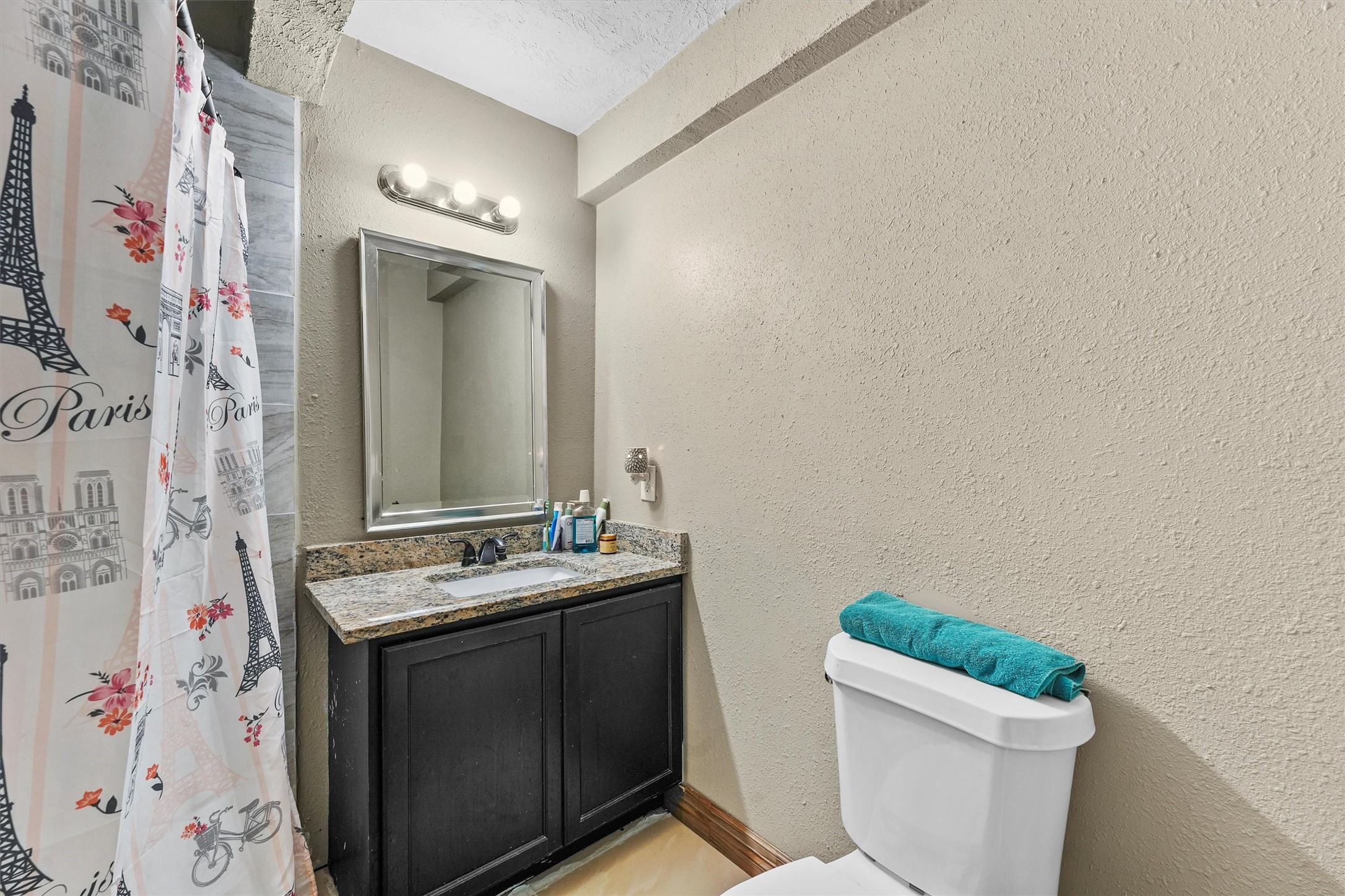 4322 Bennington Street Houston, TX 77016 - Photo 8 of 26 a bathroom with a sink and toilet