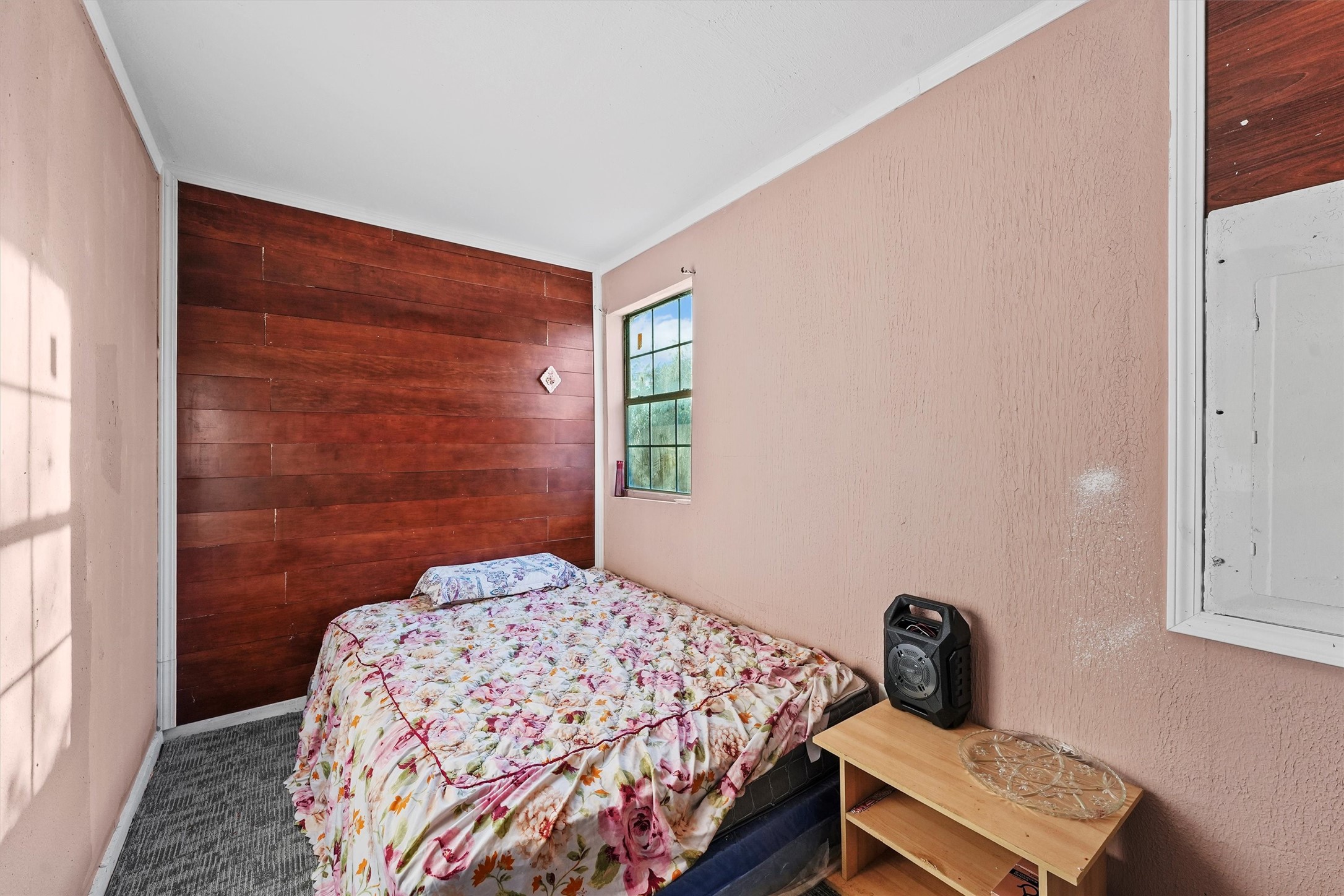 4322 Bennington Street Houston, TX 77016 - Photo 9 of 26 a bedroom with a bed and a window