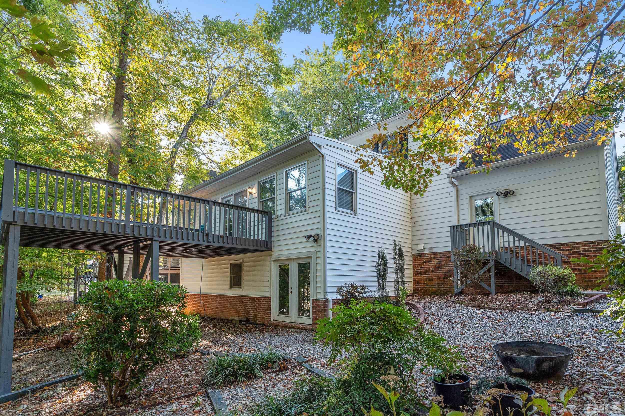 106 Keystone Drive Cary, NC 27513 - Photo 37 of 43 a front view of a house with garden
