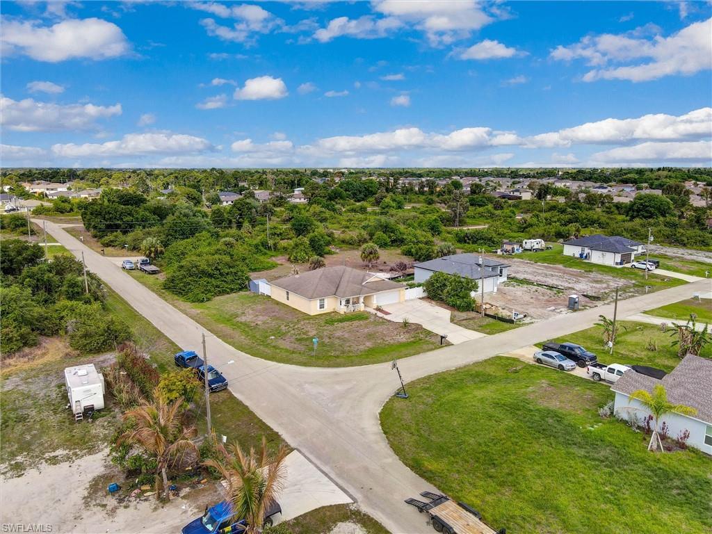 314 Rand Avenue Lehigh Acres, FL 33974 - Photo 29 of 35 a view of a lake with a mountain