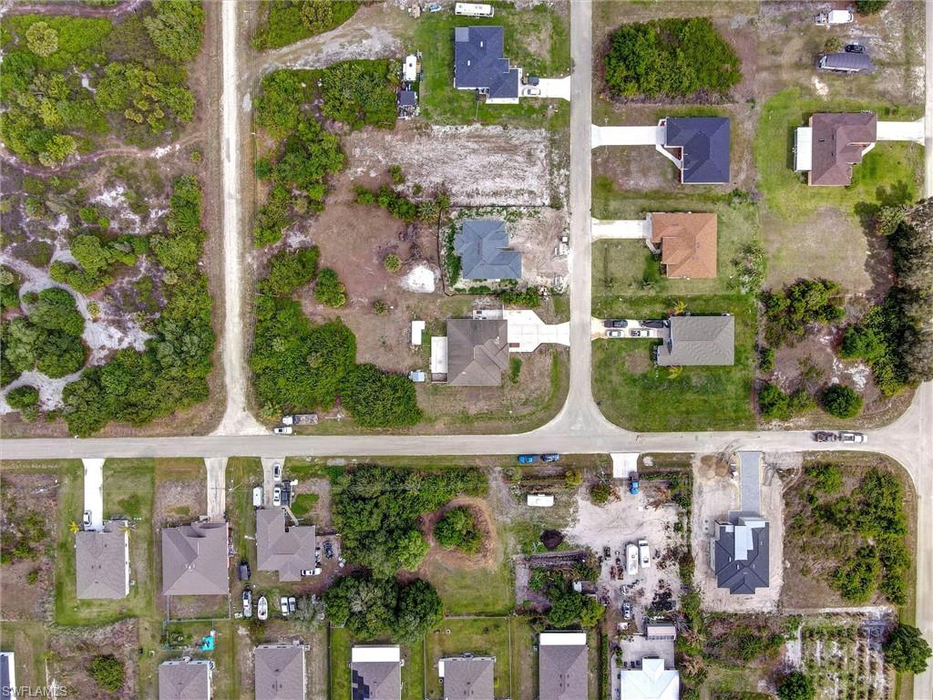 314 Rand Avenue Lehigh Acres, FL 33974 - Photo 32 of 35 an aerial view of multiple house