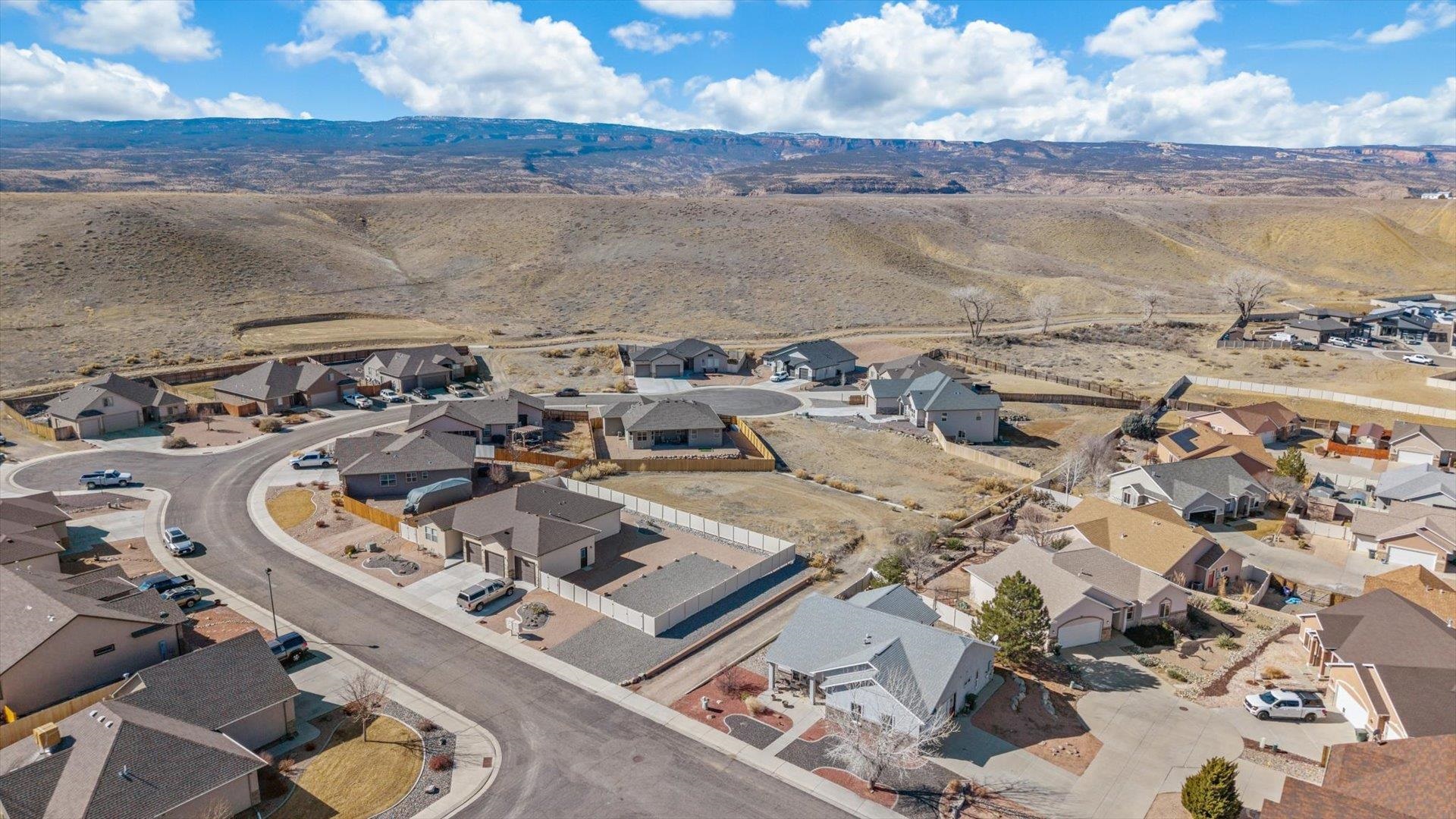 121 Dry Creek Road Grand Junction, CO 81503 - Photo 5 of 6 an aerial view of residential houses with outdoor space