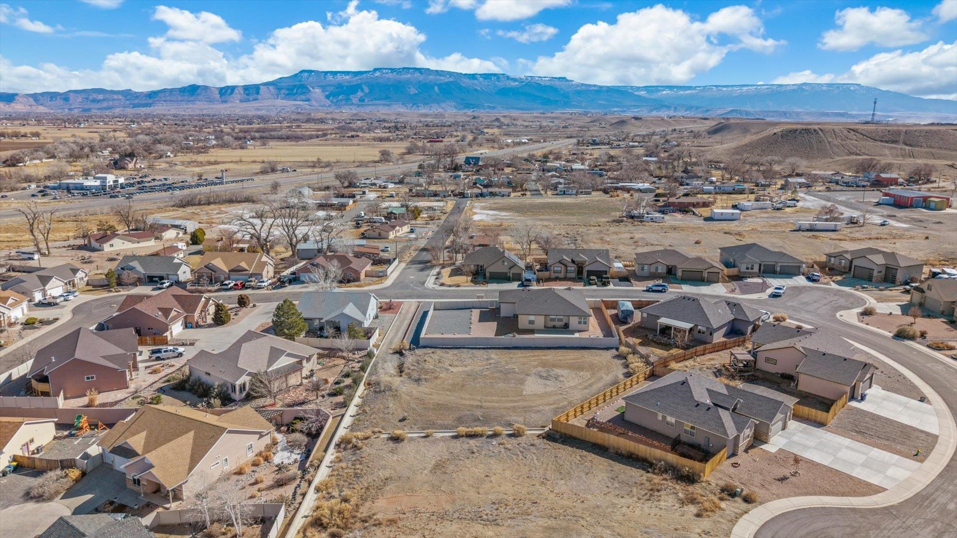 121 Dry Creek Road Grand Junction, CO 81503 - Photo 6 of 6 an aerial view of residential houses with outdoor space