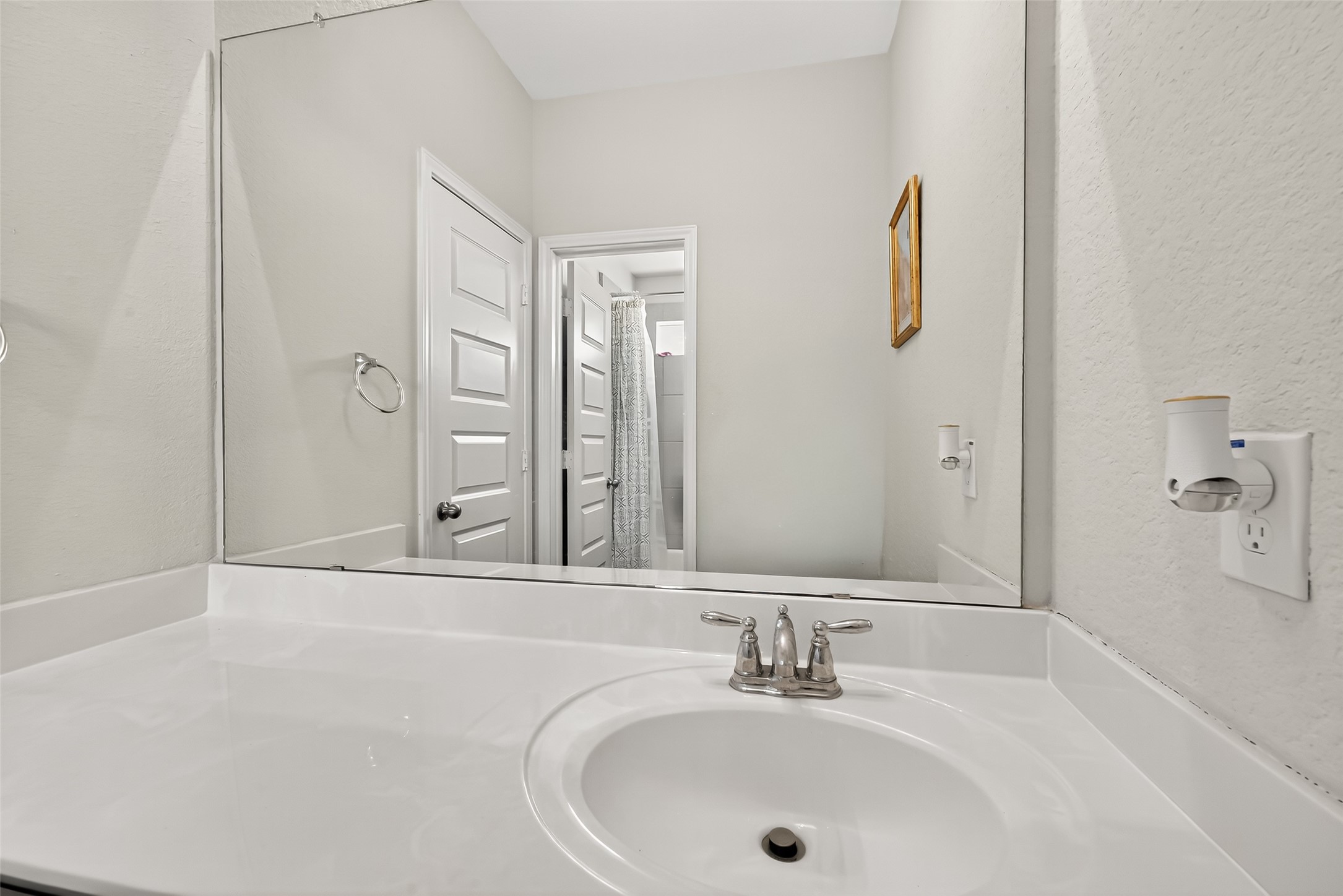 1601 Darwin Cedar Drive Rosharon, TX 77583 - Photo 32 of 44 a bathroom with a sink and a mirror