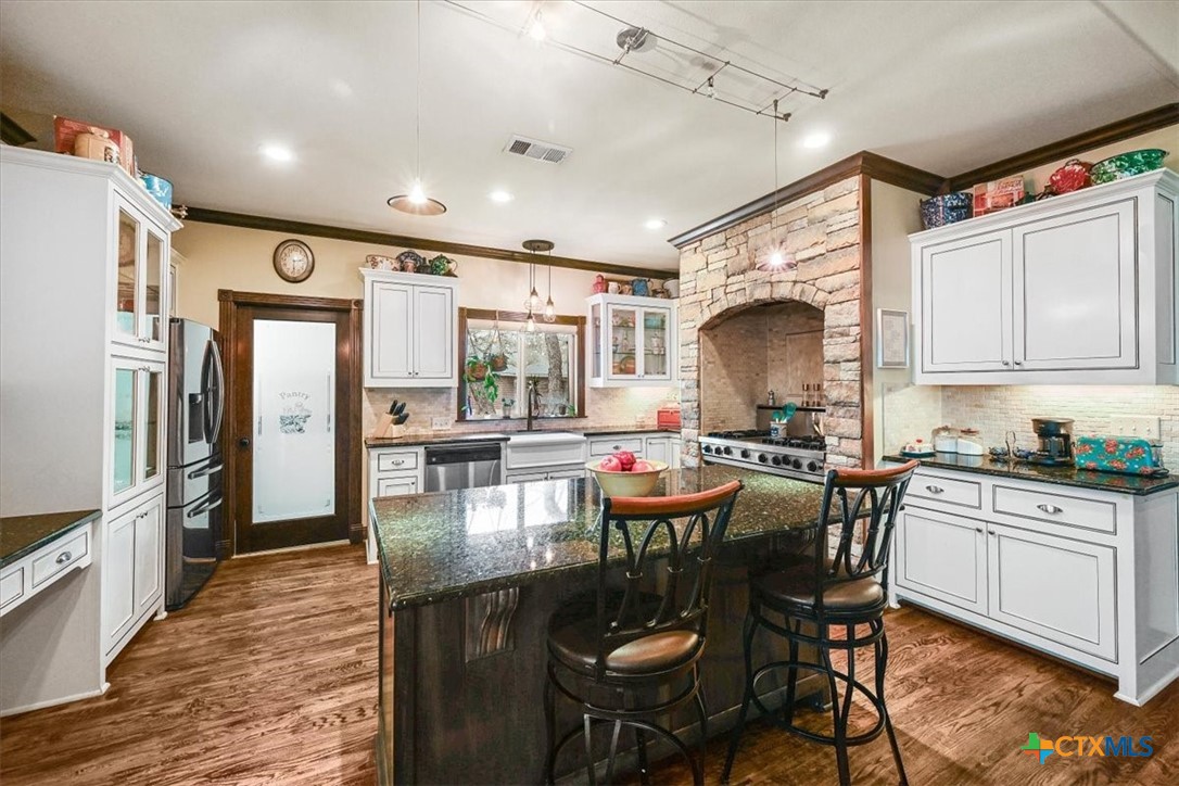 615 Benchmark Trail Belton, TX 76513 - Photo 11 of 36 a view of a dining room with furniture